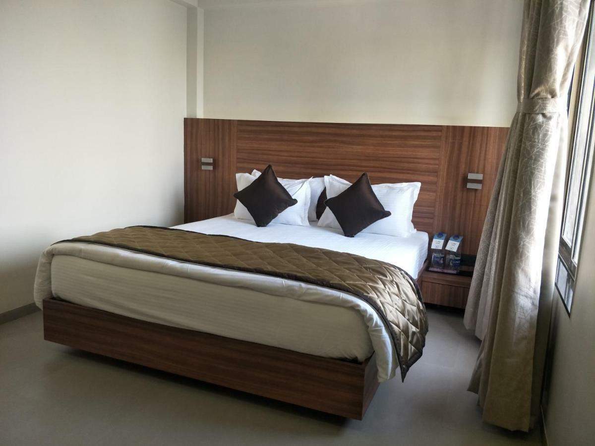 Kyriad Hotel Solapur by OTHPL Bagian luar foto