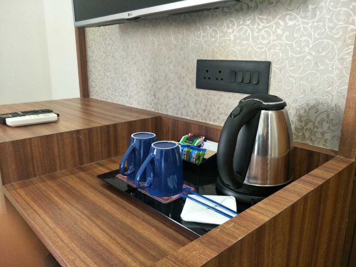 Kyriad Hotel Solapur by OTHPL Bagian luar foto